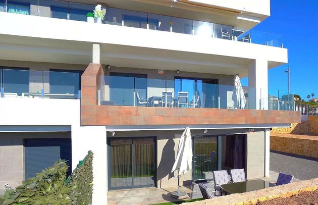 Foto 1 de Dúplex en venta en Cala de Finestrat de 4 habitaciones con terraza y piscina