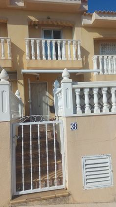 Foto 1 de Venta de casa adosada en calle Islas Canarias de 2 habitaciones con terraza y piscina