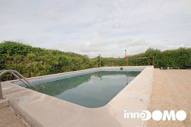 Foto 1 de Casa en venda a Palomeque de 4 habitacions amb terrassa i piscina