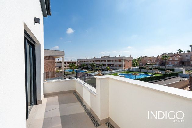 Foto 2 de Casa adosada en venta en Gran Alacant de 3 habitaciones con terraza y piscina