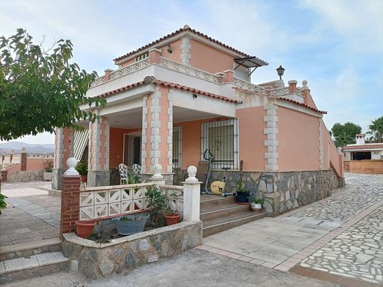 Foto 1 de Chalet en venta en Moralet - Cañada del Fenollar de 3 habitaciones con terraza y piscina