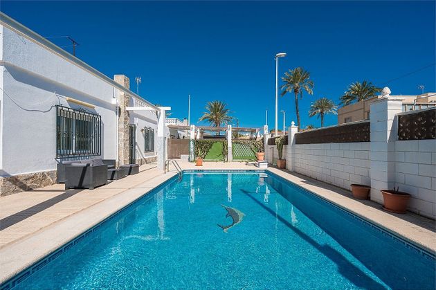 Foto 2 de Casa adossada en venda a calle Palangre de 2 habitacions amb terrassa i piscina