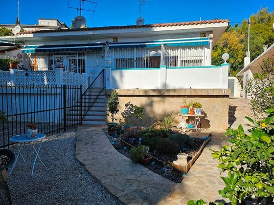 Foto 1 de Casa en venda a Pueblo Español-Coveta Fumá de 2 habitacions amb terrassa i jardí