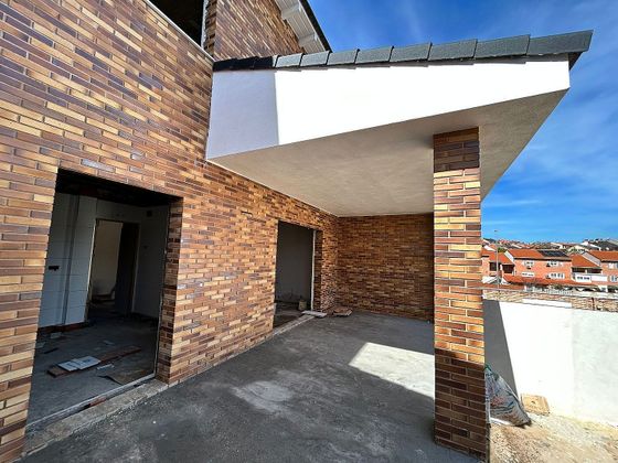 Foto 1 de Casa adosada en venta en calle Alfonso VI de 4 habitaciones con terraza y garaje