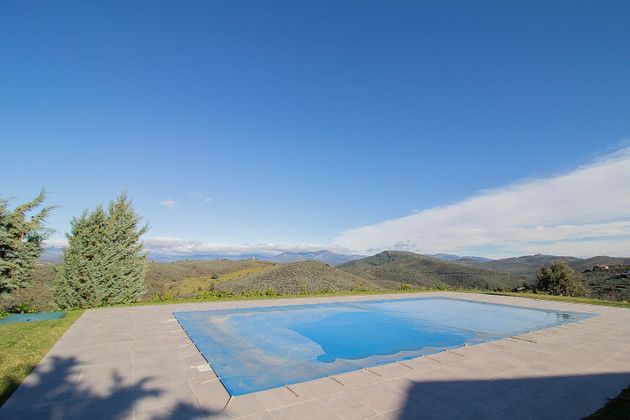 Foto 1 de Casa rural en venta en Torrelaguna de 8 habitaciones con terraza y piscina