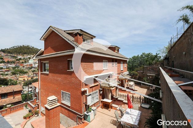 Foto 1 de Venta de casa en Santa Coloma de Cervelló de 7 habitaciones con terraza y jardín
