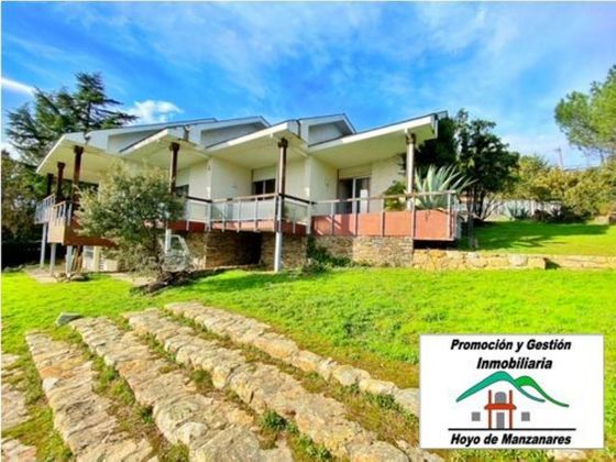 Foto 1 de Chalet en venta en Hoyo de Manzanares de 7 habitaciones con terraza y piscina