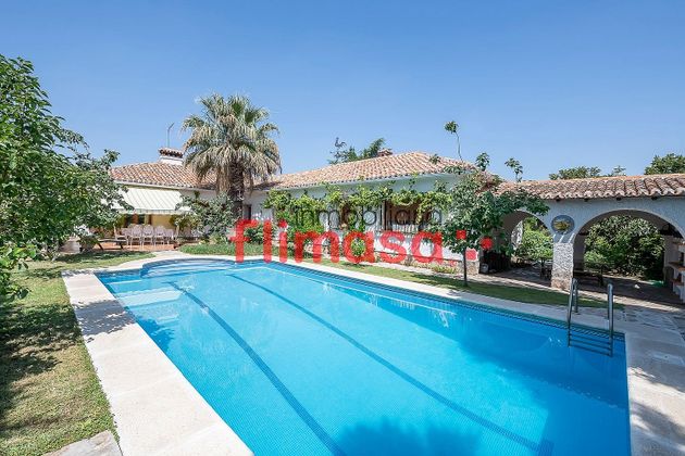 Foto 1 de Xalet en venda a El Castillo Campodón de 6 habitacions amb piscina i jardí