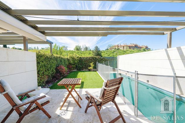 Foto 2 de Casa adosada en venta en Montecarmelo de 4 habitaciones con terraza y piscina