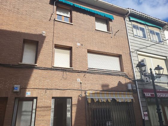 Foto 1 de Casa adossada en venda a calle Iglesia de 2 habitacions amb piscina i garatge