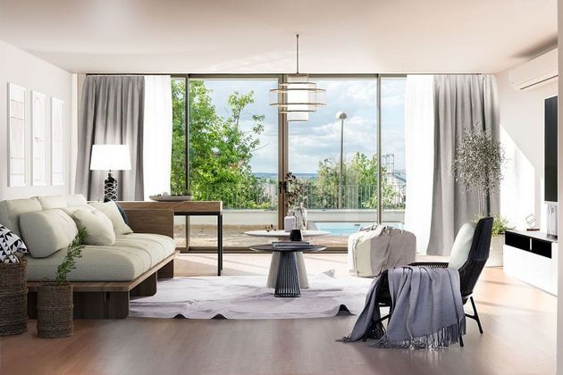 Foto 1 de Casa adossada en venda a Nuevo Aranjuez de 4 habitacions amb terrassa i piscina