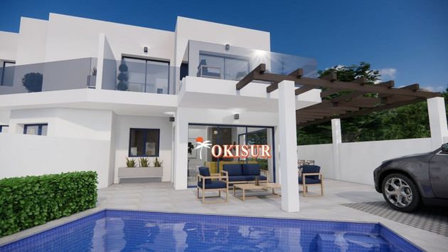 Foto 1 de Casa adosada en venta en Urb. El Palmeral de 3 habitaciones con terraza y piscina