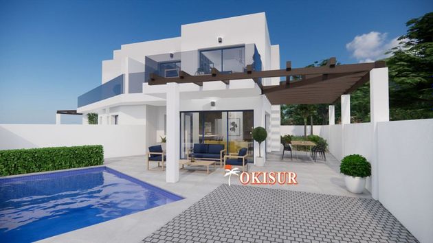 Foto 2 de Casa adossada en venda a Urb. El Palmeral de 3 habitacions amb terrassa i piscina