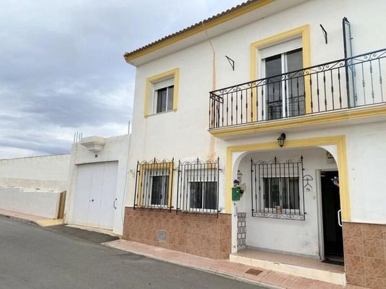 Foto 1 de Casa adossada en venda a Taberno de 4 habitacions amb terrassa i piscina