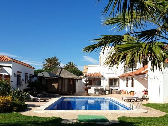 Foto 1 de Xalet en venda a Vera Ciudad de 8 habitacions amb terrassa i piscina