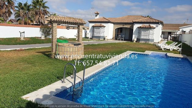Foto 1 de Venta de chalet en Las Lagunas - Campano de 3 habitaciones con terraza y piscina