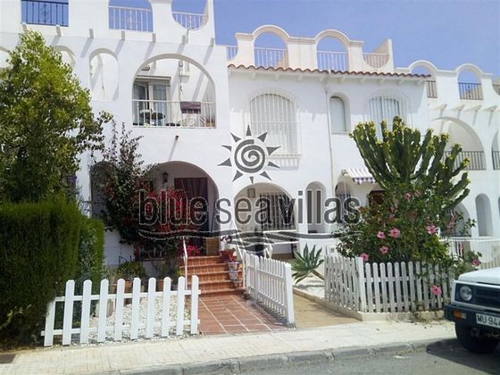 Foto 1 de Venta de casa adosada en calle Miguel Hernández de 2 habitaciones con terraza y piscina
