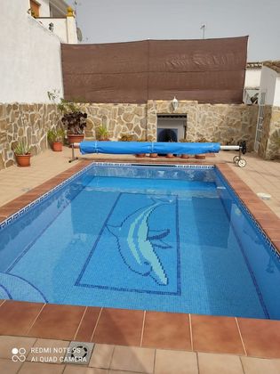 Foto 1 de Casa adossada en venda a Encinas Reales de 6 habitacions amb terrassa i piscina