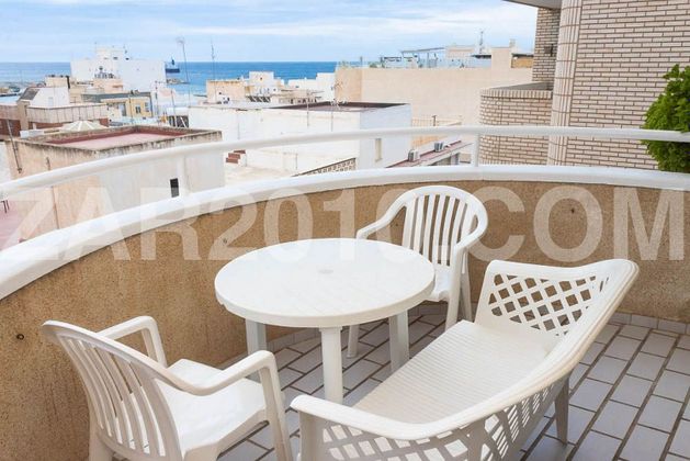 Foto 1 de Venta de piso en Puerto de Garrucha de 2 habitaciones con terraza y piscina