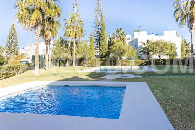 Foto 2 de Venta de casa adosada en El Playazo de 3 habitaciones con terraza y piscina