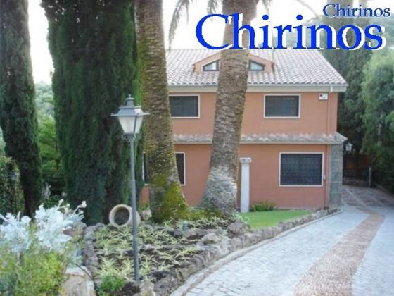 Foto 1 de Chalet en venta en El Brillante -El Naranjo - El Tablero de 6 habitaciones con terraza y piscina