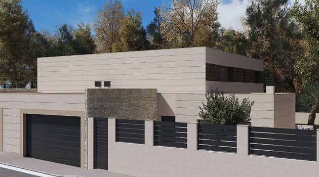 Foto 2 de Casa en venda a Miramadrid de 4 habitacions amb garatge i jardí