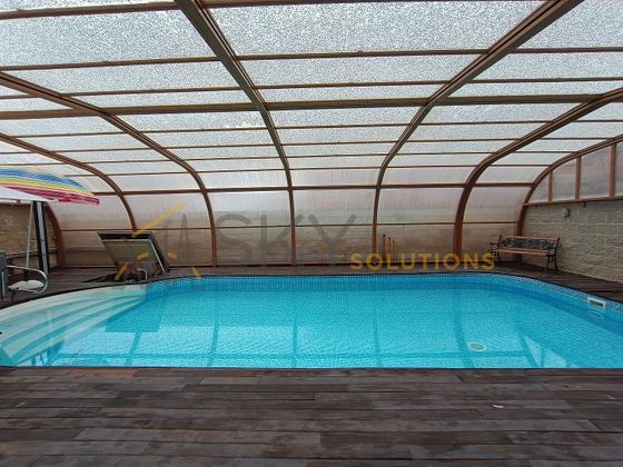 Foto 1 de Casa adossada en venda a Miramadrid de 4 habitacions amb piscina i garatge