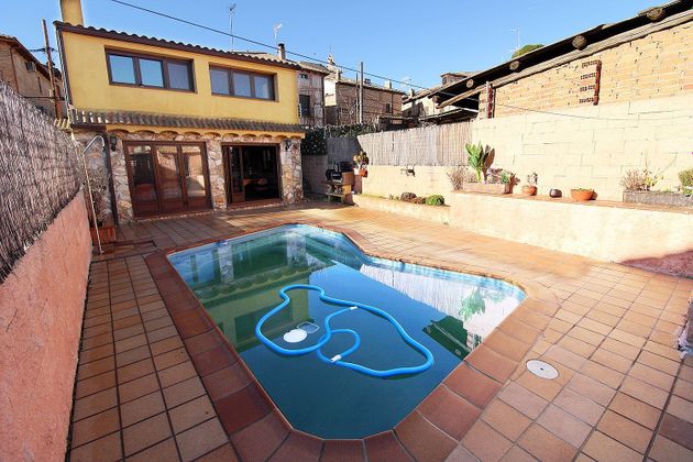 Foto 1 de Casa en venda a Torrelaguna de 4 habitacions amb piscina i jardí