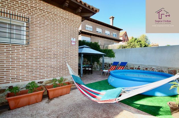Foto 1 de Venta de casa en Pedrezuela de 3 habitaciones con terraza y piscina