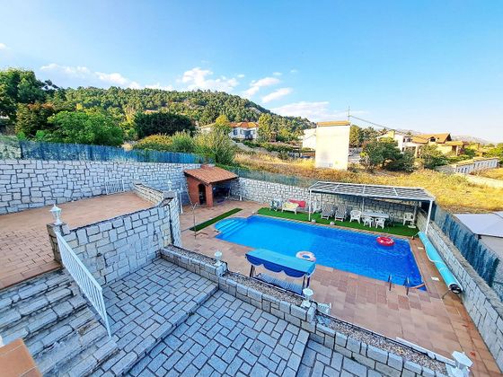 Foto 1 de Chalet en venta en Becerril de la Sierra de 6 habitaciones con terraza y piscina