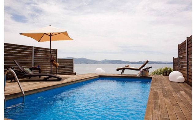 Foto 1 de Casa adossada en venda a Sanxenxo de 4 habitacions amb terrassa i piscina