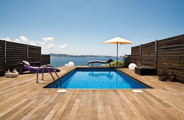 Foto 2 de Casa adosada en venta en Sanxenxo de 4 habitaciones con terraza y piscina
