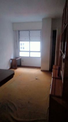 Foto 1 de Venta de piso en Praza Independencia de 1 habitación con aire acondicionado y ascensor