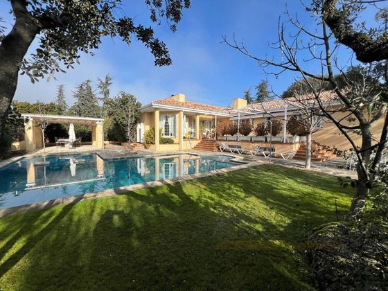 Foto 1 de Casa en venda a Hoyo de Manzanares de 6 habitacions amb piscina i jardí