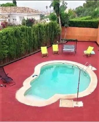 Foto 1 de Venta de chalet en Parque Ayala - Jardín de la Abadía - Huelín de 3 habitaciones con piscina y garaje