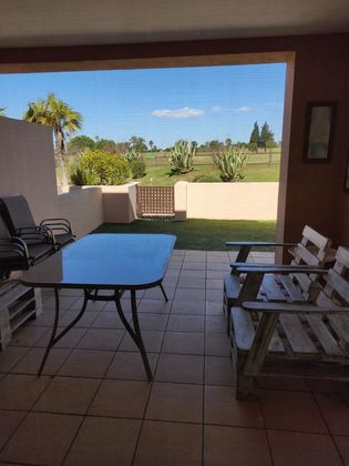 Foto 1 de Casa adossada en venda a Villanueva Golf de 3 habitacions amb terrassa i piscina