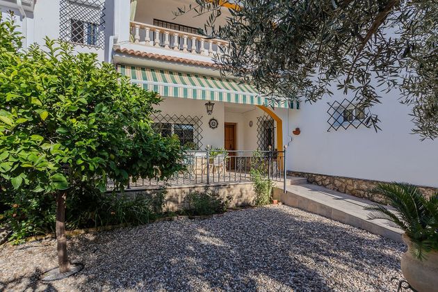 Foto 1 de Casa adossada en venda a El Brillante -El Naranjo - El Tablero de 6 habitacions amb terrassa i piscina