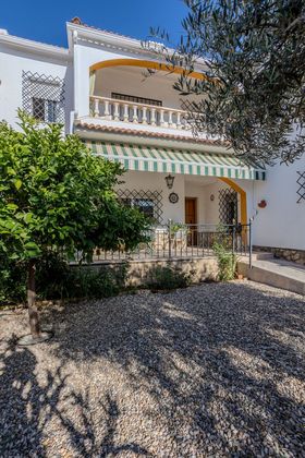Foto 2 de Casa adossada en venda a El Brillante -El Naranjo - El Tablero de 6 habitacions amb terrassa i piscina