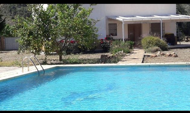 Foto 1 de Venta de casa rural en calle Alcora de 3 habitaciones con terraza y piscina