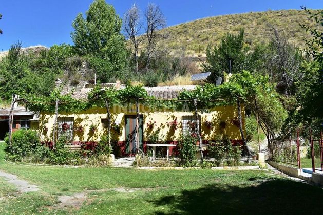 Foto 1 de Venta de casa rural en Caniles de 4 habitaciones con piscina y garaje
