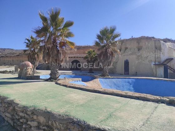 Foto 1 de Venta de casa rural en Huéscar de 4 habitaciones con piscina