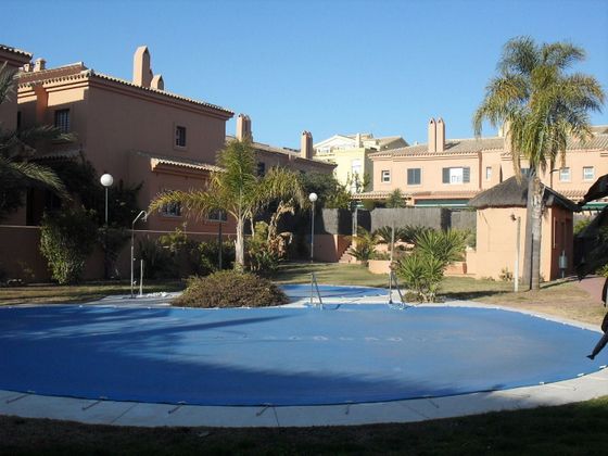 Foto 1 de Casa adossada en lloguer a Vistahermosa  - Fuentebravía de 3 habitacions amb piscina i jardí
