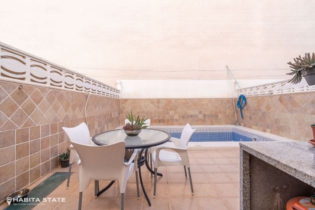 Foto 1 de Casa en venta en calle Reino de Almeria de 3 habitaciones con terraza y piscina