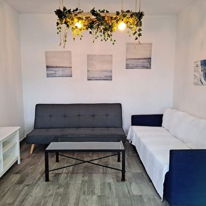 Foto 2 de Pis en venda a Centro-Calzada-Cabo Noval de 2 habitacions amb aire acondicionat