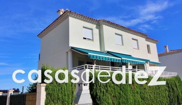 Foto 1 de Casa adosada en venta en calle Benifal de 4 habitaciones con terraza y piscina