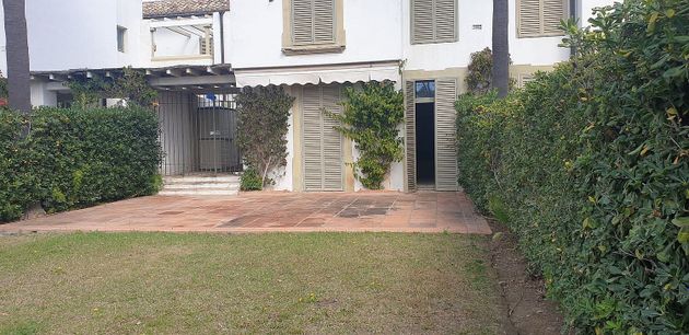 Foto 1 de Casa adossada en venda a avenida De la Marina de 3 habitacions amb terrassa i piscina