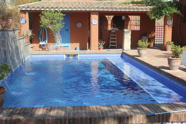 Foto 1 de Xalet en venda a Poniente-Norte - Miralbaida - Parque Azahara de 3 habitacions amb piscina i garatge