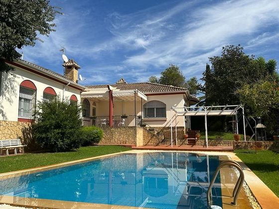 Foto 1 de Chalet en venta en El Brillante -El Naranjo - El Tablero de 6 habitaciones con piscina y jardín