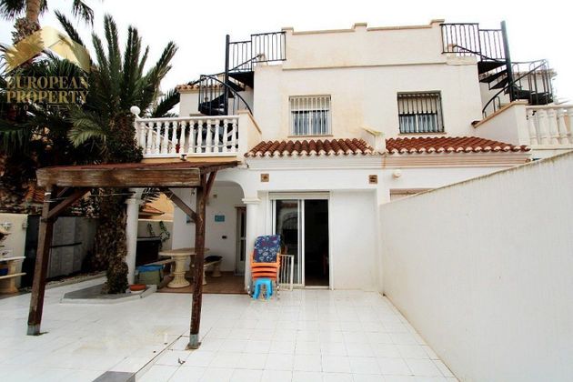 Foto 1 de Casa adossada en venda a San Juan de los Terreros de 4 habitacions amb terrassa i aire acondicionat