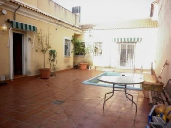 Foto 1 de Casa adossada en venda a Poniente-Norte - Miralbaida - Parque Azahara de 4 habitacions amb terrassa i piscina